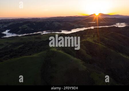 A brilliant sunrise greets the hills of the East Bay, not far from San Francisco Bay in California. Stock Photo