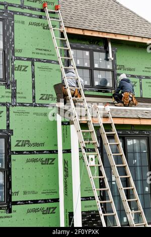 Flourtown, PA - Dec. 9, 2020: Construction on a house with ZIP System wall sheathing which has integrated structural, water and air management layers. Stock Photo
