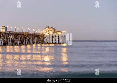 Coastal scene at dawn with a view of the Oceanside Pier. Oceanside, California, USA. Stock Photo