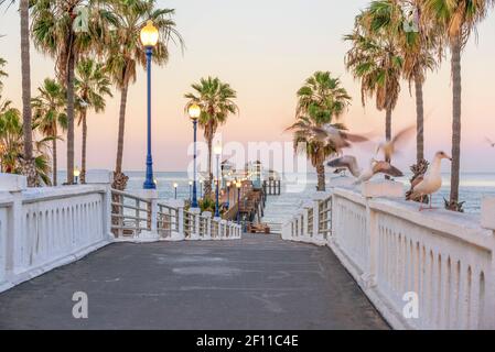 Coastal scene at dawn with a view of the Oceanside Pier. Oceanside, California, USA. Stock Photo