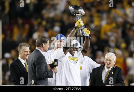 Super Bowl MVP Pittsburgh Steelers Santonio Holmes holds the Vince Lombardy  Trophy after his team defeated the Arizona Cardinals 27-23 at Super Bowl  XLIII at Raymond James Stadium in Tampa, Florida, on