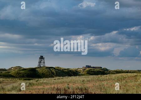 Sand dunes of Blavand beach in Denmark with watch tower and bunker Stock Photo