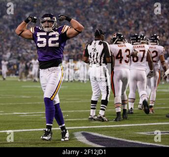 Minnesota Vikings Chad Greenway (C) celebrates his 37 yard interception  return for a touchdown against the New York Giants in the fourth quarter  with Ben Leber (51) at Giants Stadium in East