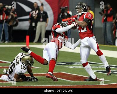 16 November 2008: Saints receiver Lance Moore tries for extra yards with a  Chiefs defender hanging on after making a reception makes a reception. Moore  had 8 receptions for 102 yards and