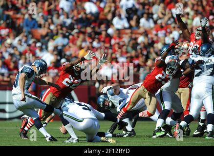 December 5, 2010; Seattle, WA, USA; Seattle Seahawks place kicker Olindo  Mare (10) kicks an extra point against the Carolina Panthers during the  third quarter at Qwest Field. Seattle defeated Carolina 31-14 Stock Photo -  Alamy