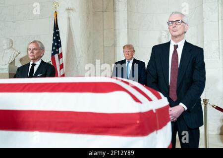President Donald Trump and First Lady Melania Trump pay their respects at the funeral service Monday July 22 2019 for retired U.S. Supreme Court Associate Justice John Paul Stevens at the Supreme Court of the United States in Washington D.C. Stock Photo