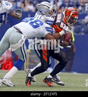 Washington Redskins wide receiver Santana Moss misses a pass from  quarterback Jason Campbell as he is covered by Dallas Cowboys Ken Hamlin  (26) and Terence Newman (41) during the third quarter at