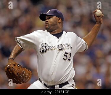 Milwaukee Brewers pitcher CC Sabathia reacts after giving up a