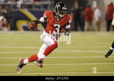 Atlanta Falcons quarterback D.J. Shockley hands the football off