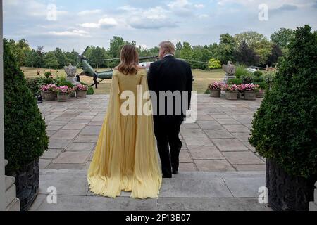President Donald Trump and First Lady Melania Trump participate in an arrival ceremony at Blenheim Palace with Prime Minister Theresa May and her husband Philip May | July 12 2018 Stock Photo