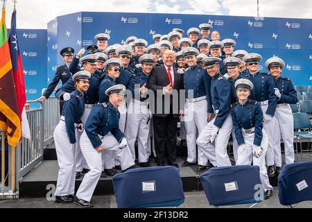 President Donald Trump poses for a photo with some graduates following the 2019 U.S. Air Force Academy Graduation Ceremony Thursday May 30 3019 at the U.S. Air Force Academy-Falcon Stadium in Colorado Springs Colo. Stock Photo