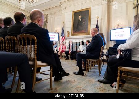 President Donald Trump delivers remarks at a celebration of the one-year anniversary of his Pledge to America's Workers Thursday July 25 2019 in the State Dining Room of the White House. Stock Photo