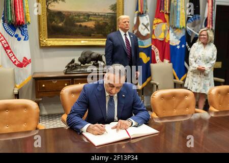 President Donald Trump welcomes Prime Minister Mustafa Al-Kadhimi of the Republic Iraq to sign the guestbook Thursday Aug. 20 2020 in the Roosevelt Room of the White House. Stock Photo