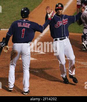 Cleveland Indians' Victor Martinez celebrates as he rounds the