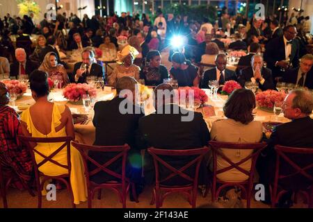 President Barack Obama talks with President Ali Bongo Ondimba of the Gabonese Republic during the U.S.-Africa Leaders Summit dinner on the South Lawn of the White House, Aug. 5, 2014 Stock Photo