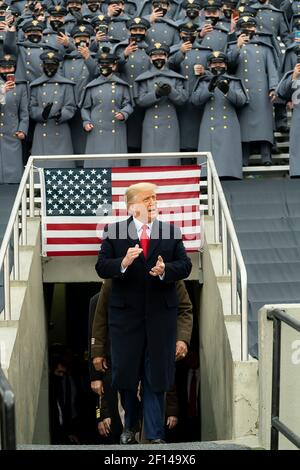 President Donald Trump walks out and applauds the crowd of cadets as he is introduced  Saturday Dec. 12 2020 at the 121st Army-Navy football game at Michie Stadium at the U.S. Military Academy at West Point N.Y. Stock Photo