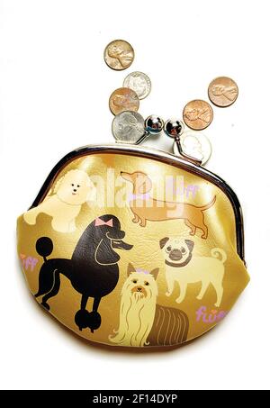 Quarters for the parking meter, spare change left over from your daily  lattes, both good reasons to keep a coin purse instead of dumping all that  silver in the bottom of your handbag. Collect that extra jingle in one of  Fluff's animal-motif coin purses. Made of