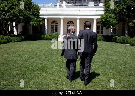 President Barack Obama and Chief of Staff Rahm Emanuel walk across the Rose Garden of the White House following the Economic Daily Briefing which was held outdoors June 17 2010. Stock Photo