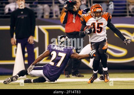 Cincinnati Bengals wide receiver Chris Henry, left, pulls in an 11-yard  touchdown pass despite the effort of Denver Broncos cornerback Darrent  Williams, right, during the second quarter of their football game in