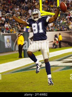 Sep 16, 2007 - Miami Gardens, FL, USA - Dallas Cowboys quarterback TONY ROMO,  (R), celebrates a touchdown with TERRELL OWENS late in the fourth quarter  Sunday at Dolphin stadium. Cowboys 37-20