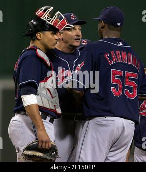 The Cleveland Indians Ben Broussard (C) hit a three run home run to deep  left center in the third inning scoring Victor Martinez (R) and Ronnie  Belliard (L) off of the Baltimore