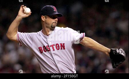 Boston Red Sox catcher Jason Varitek jumps into the arms of pitcher Keith  Foulke after the final out of game four of the World Series beating the St.  Louis Cardinals 3-0 at