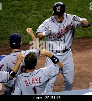 Cleveland Indians outfielder Kenny Lofton, left, talks with hitting coach  Derek Shelton before the Indians' baseball game against the Minnesota  Twins, Friday, July 27, 2007, in Cleveland. Lofton was traded from the