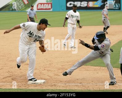 Florida Marlins' Luis Castillo, left, congratulates Juan