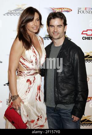 Jeff Gordon and wife Ingrid Vandebosch play with their kids at