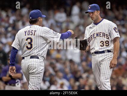 Milwaukee Brewers manager Ned Yost (L) and Hall of Famer Robin Yount (R)  watch their team against the Colorado Rockies in the thirdd inning at Coors  Field in Denver, Colorado July 31