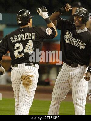 Florida Marlins' Hanley Ramirez scores on a first inning single by