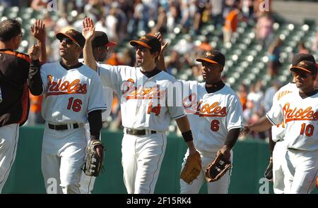 Baltimore Orioles' Chris Gomez (left) and Jay are all smiles after