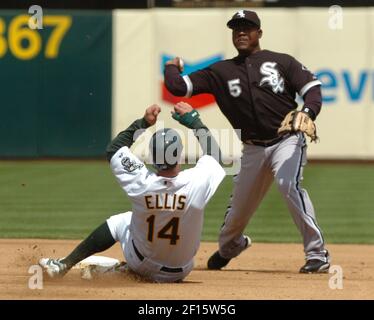 Rajai Davis and Mike Aviles by Duane Burleson