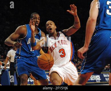 New York Knicks' Darko Milicic (3) of Serbia looks to pass around Golden  State Warriors' Corey Maggette (50) during an NBA basketball game Friday,  Nov.13, 2009, in New York. (AP Photo/Kathy Kmonicek