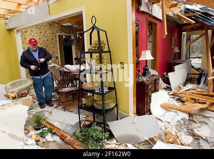 Patrick Knopf photographs the damage to his parents Brookstone