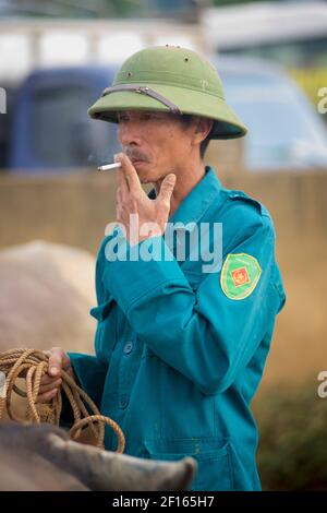 Vietnam Vietnamese Man Smoking A Cigarette Mekong Delta Stock Photo - Alamy