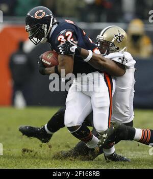 Chicago Bears' Cedric Benson breaks away from New Orleans Saints'