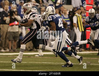 New England Patriots receiver Troy Brown stretches prior to game against  the Denver Broncos during the AFC divisional playoff game at Invesco Field  in Denver on January 14, 2006. (UPI Photo/Gary C.