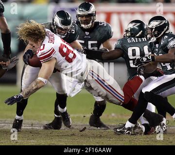 New York Giants defender Michael Strahan looks dejected while waiting on  the sidelines. The Detroit Lions defeated the New York Giants 28 to 13 at  Giants Stadium in East Rutherford, New Jersey