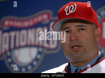 Washington Nationals General Manager Jim Bowden, right, holds up a jersey  during a news conference introducing Manny Acta as the baseball team's new  manager in Washington, Tuesday, Nov. 14, 2006. (AP Photo/Lawrence