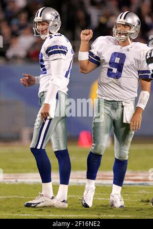 Dallas Cowboys holder Tony Romo (right) can't get the ball placed for  kicker Martin Gramatica to attempt a field goal against the Seattle  Seahawks late in the fourth quarter of NFC Wild-Card