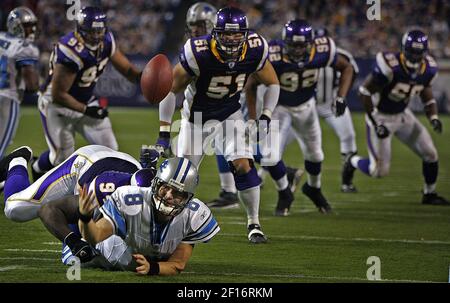 Minnesota Vikings defensive tackle Pat Williams looks at a replay