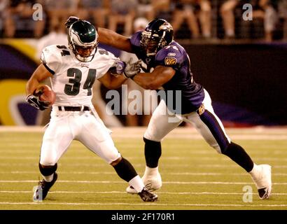 Baltimore Ravens Ray Lewis (52) sticks out his tongue during an