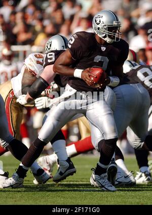 Oakland Raiders quarterback Aaron Brooks (2) is hit by Cincinnati