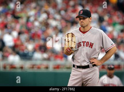 Boston Red Sox pitcher Lenny DiNardo walks back to the mound after the  Toronto Blue Jays scored on a double by teammate Troy Glaus during first  inning AL action in Toronto Saturday