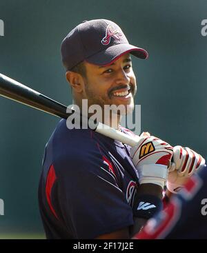 Atlanta Braves outfielder Brian Jordan, right, celebrates with his