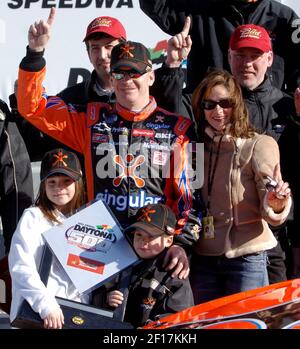 Jeff Burton center celebrates in victory lane with his wife Kim