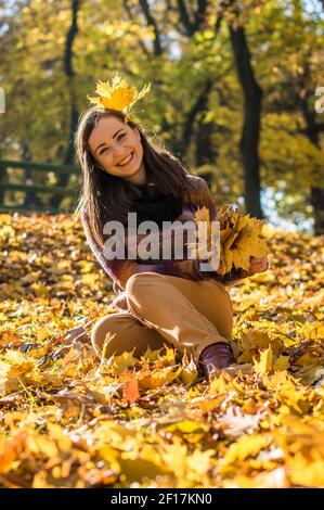 Beautiful girl in autumn Park Stock Photo