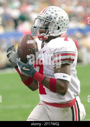 Ohio State's Ted Ginn Jr. scores on a 56 yard reception to put the Buckeyes  up over Notre Dame 13-7 in the first half of the Fiesta Bowl January 2,  2006 in