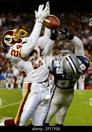 San Francisco, California, USA. 25th Sep, 2005. San Francisco 49ers  defensive back Tony Parrish (33) intercepts ball from Dallas Cowboys wide  receiver Terry Glenn (83) on Sunday, September 25, 2005, in San